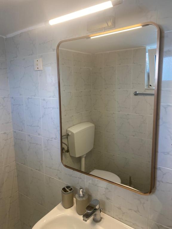 A bathroom at Sindonia beach Apartment's