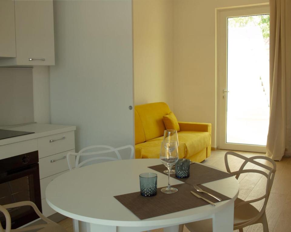 Posezení v ubytování SUNSHINE LUXURY APARTMENTS - Private Pool and Beach - Policoro Lido