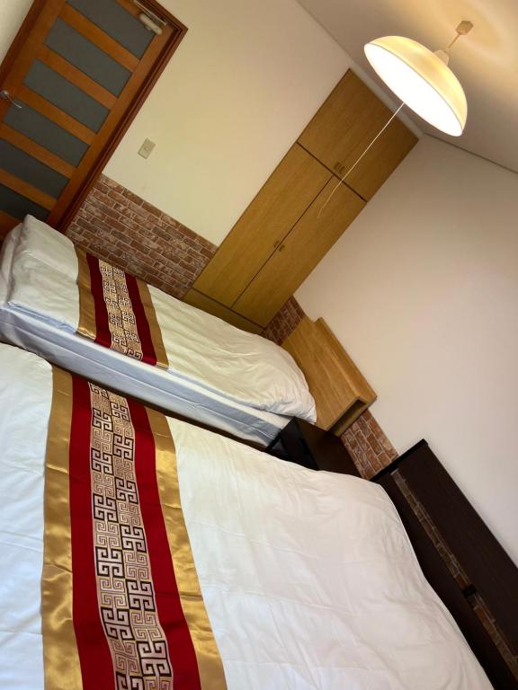 Letto o letti in una camera di 天满宿