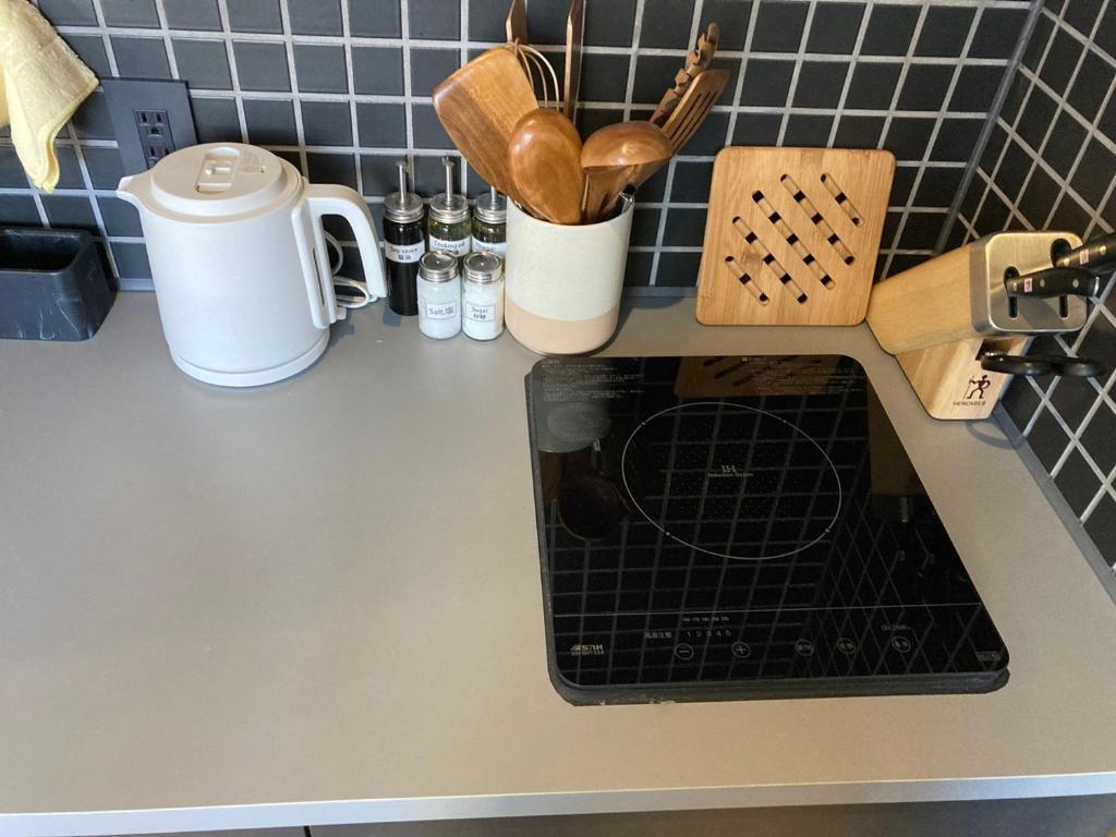 Kuchyň nebo kuchyňský kout v ubytování STAY ARI Apartment Hotel Shinjuku-Takadanobaba