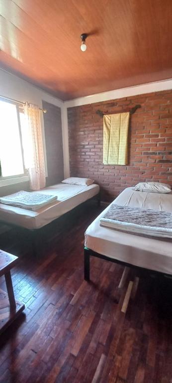 Postel nebo postele na pokoji v ubytování Agora Home