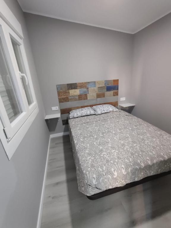 Postel nebo postele na pokoji v ubytování Casa IULIAN