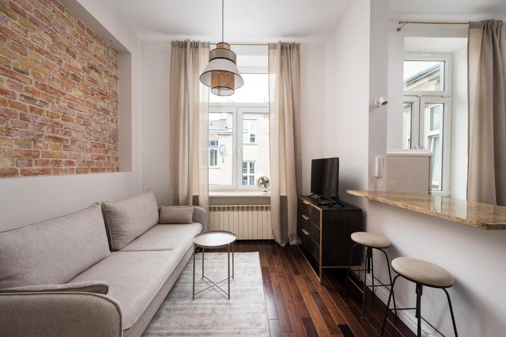 Posedenie v ubytovaní Hoża 62 Deluxe Studio