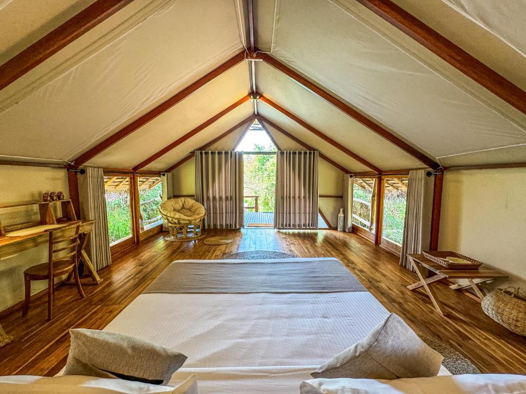 Postel nebo postele na pokoji v ubytování Glamping Wilpattu by Thamaravila