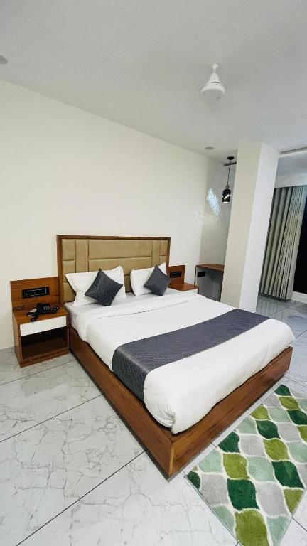 Postel nebo postele na pokoji v ubytování Hotelmaple tree