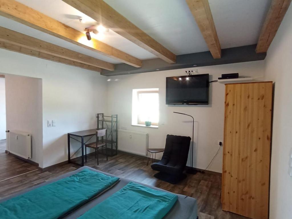 Postel nebo postele na pokoji v ubytování Fewo Wiesenblick