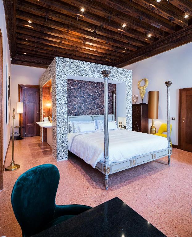 Postel nebo postele na pokoji v ubytování Hotel Heureka