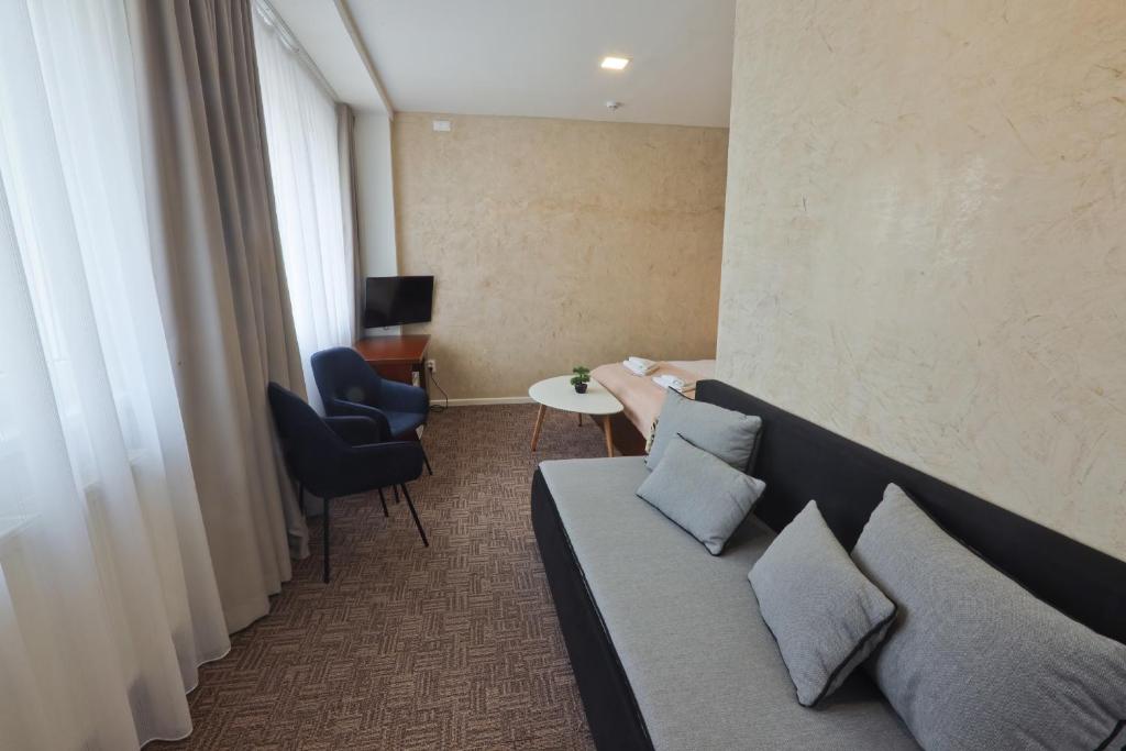 TV a/nebo společenská místnost v ubytování Hotel Slanica