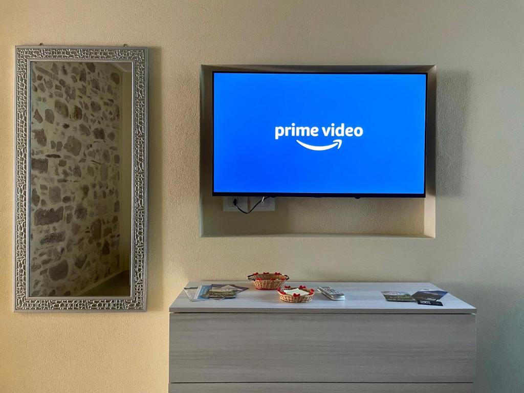 TV a/nebo společenská místnost v ubytování Casa Nina - 10' dalla spiaggia