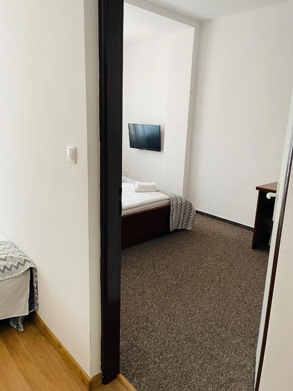 Postel nebo postele na pokoji v ubytování Hotel Slanica