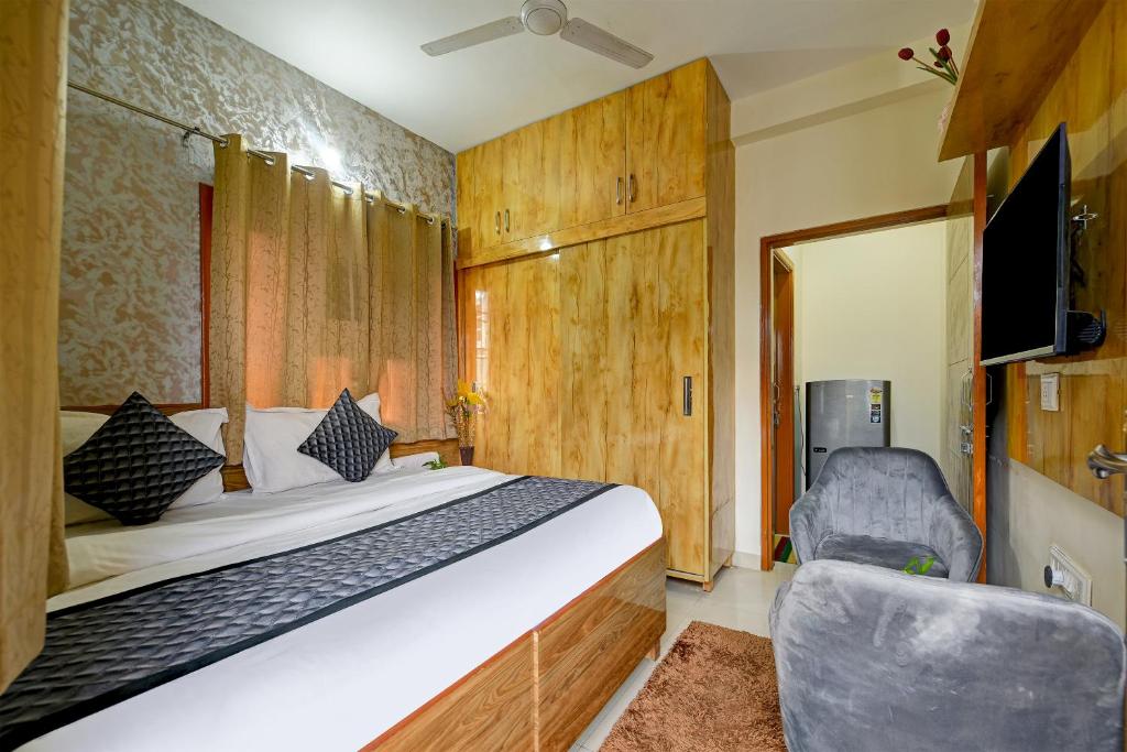 En eller flere senge i et værelse på Marina Heritage & Home Near Artemis Hospital