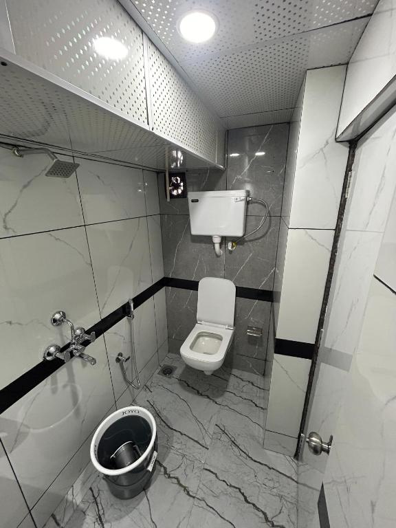 Koupelna v ubytování Hotel Rinza Residency