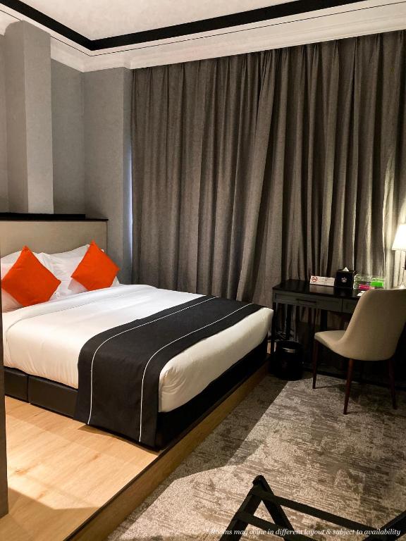 Postel nebo postele na pokoji v ubytování Stanton Hotel