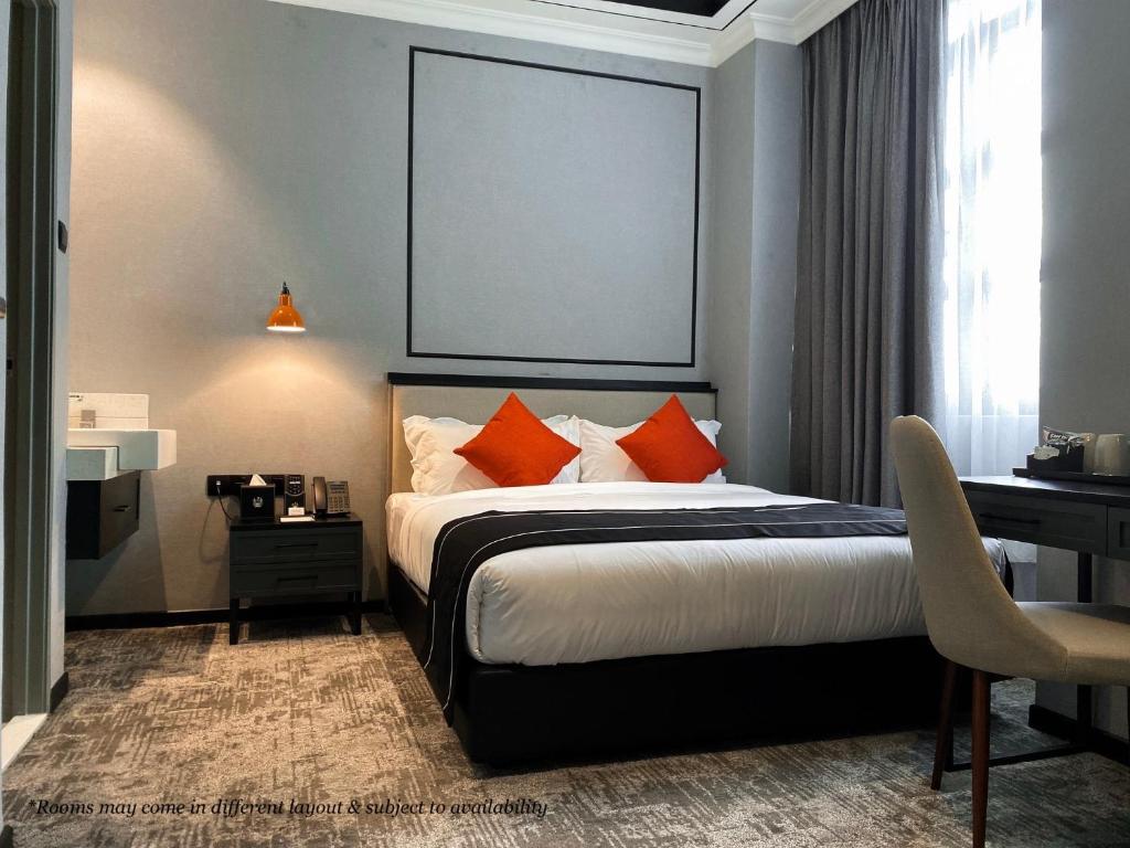 Postel nebo postele na pokoji v ubytování Stanton Hotel