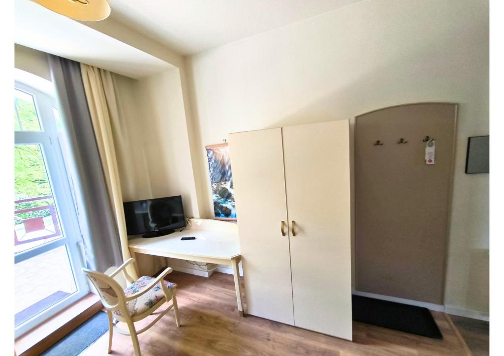 TV a/nebo společenská místnost v ubytování Villa Lessing