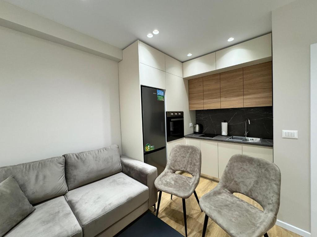 Kuchyň nebo kuchyňský kout v ubytování E&R Apartments at Myslym Shyri