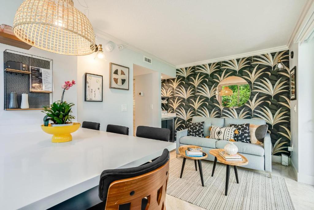 a living room with a couch and a table at The Palms Coconut Grove 1 bedroom condo includes parking in Miami