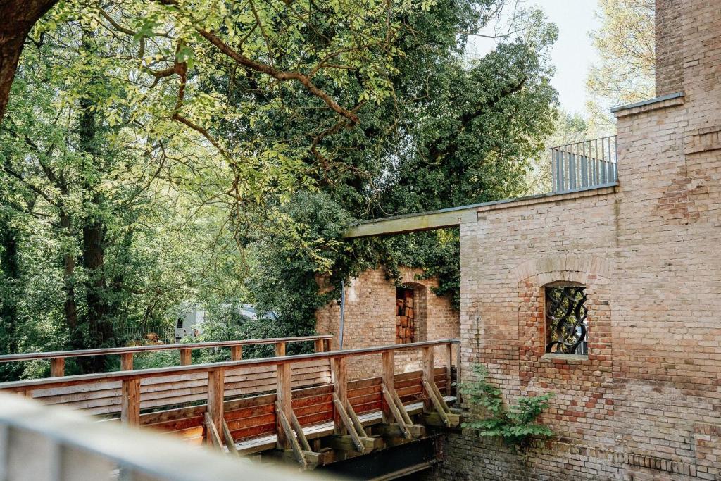 O grădină în afara Ferienwohnungen in der Wassermühle am Schloss