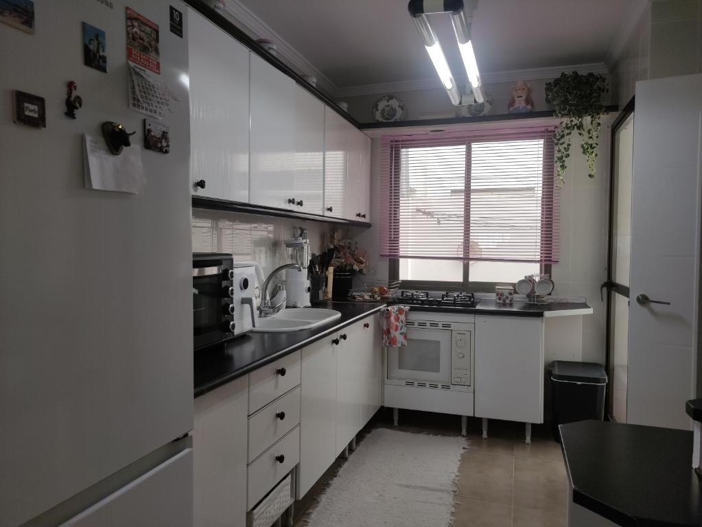 Kuchyňa alebo kuchynka v ubytovaní Isis Apartment