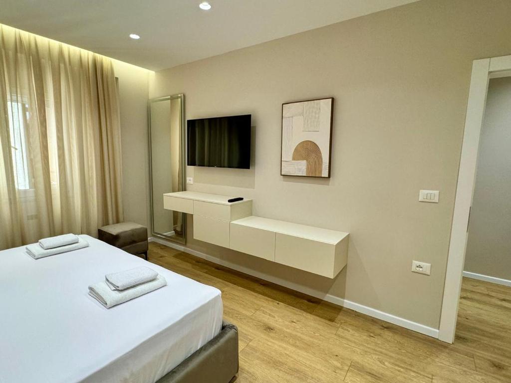 TV a/nebo společenská místnost v ubytování E&R Apartments at Myslym Shyri