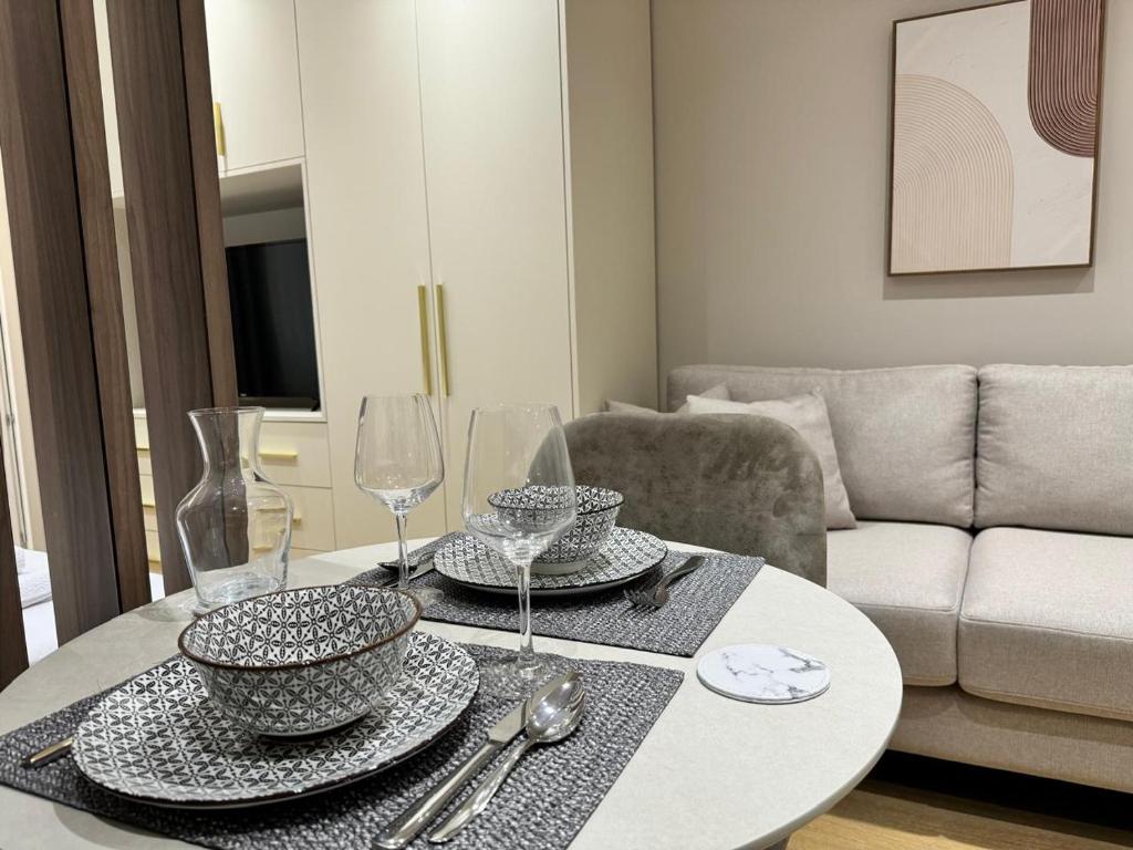 Posezení v ubytování E&R Apartments at Myslym Shyri