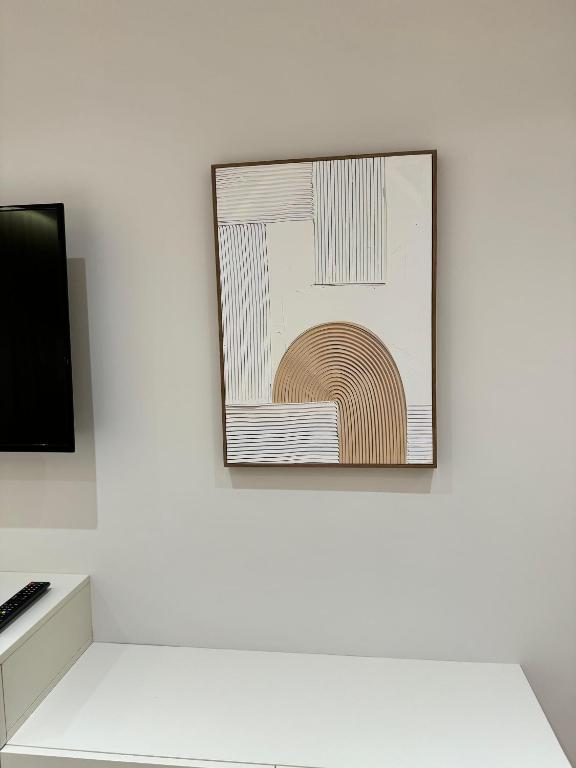 TV a/nebo společenská místnost v ubytování E&R Apartments at Myslym Shyri