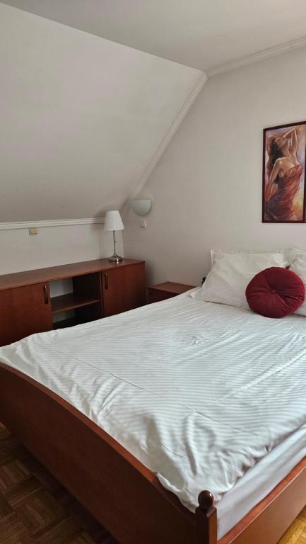 Postel nebo postele na pokoji v ubytování Guest House Pod Grebenom