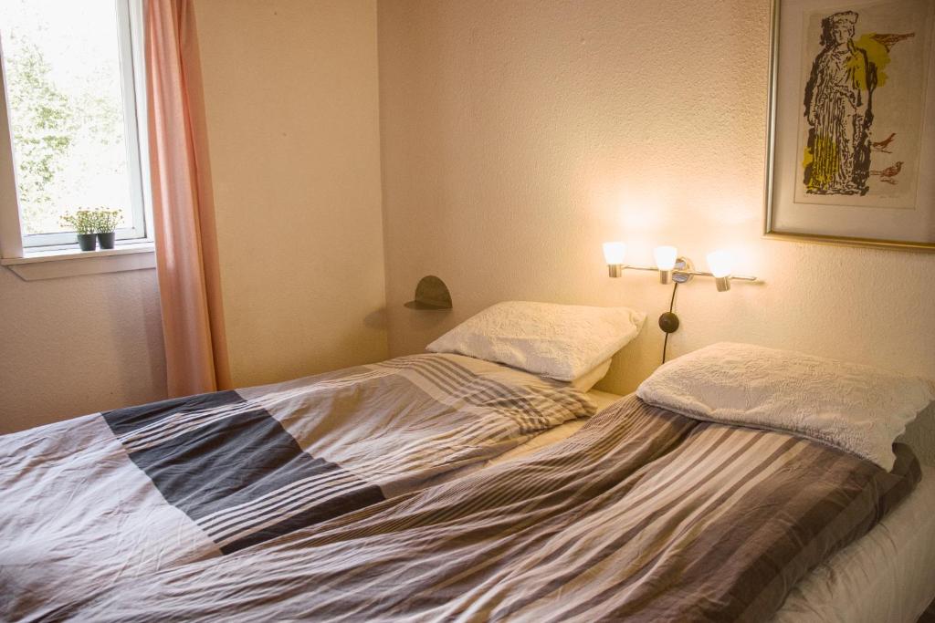 Postel nebo postele na pokoji v ubytování Astrup vig Spa og Sauna