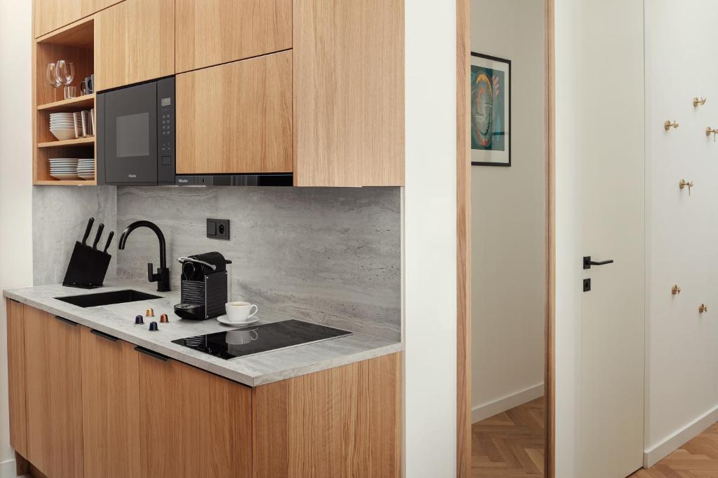 Kuchyň nebo kuchyňský kout v ubytování R16 Residences Prague