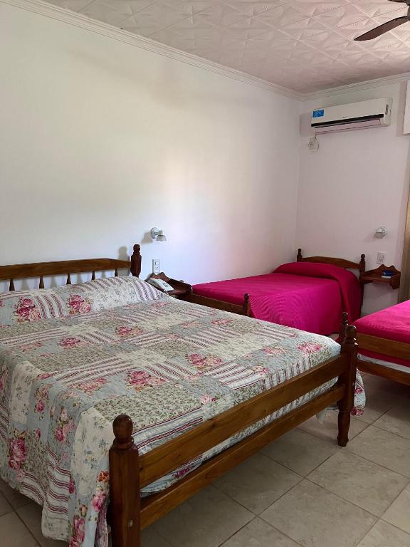 Postel nebo postele na pokoji v ubytování Hosteria Prince