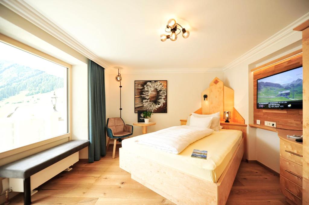 Ein Bett oder Betten in einem Zimmer der Unterkunft Hotel Jägerhof