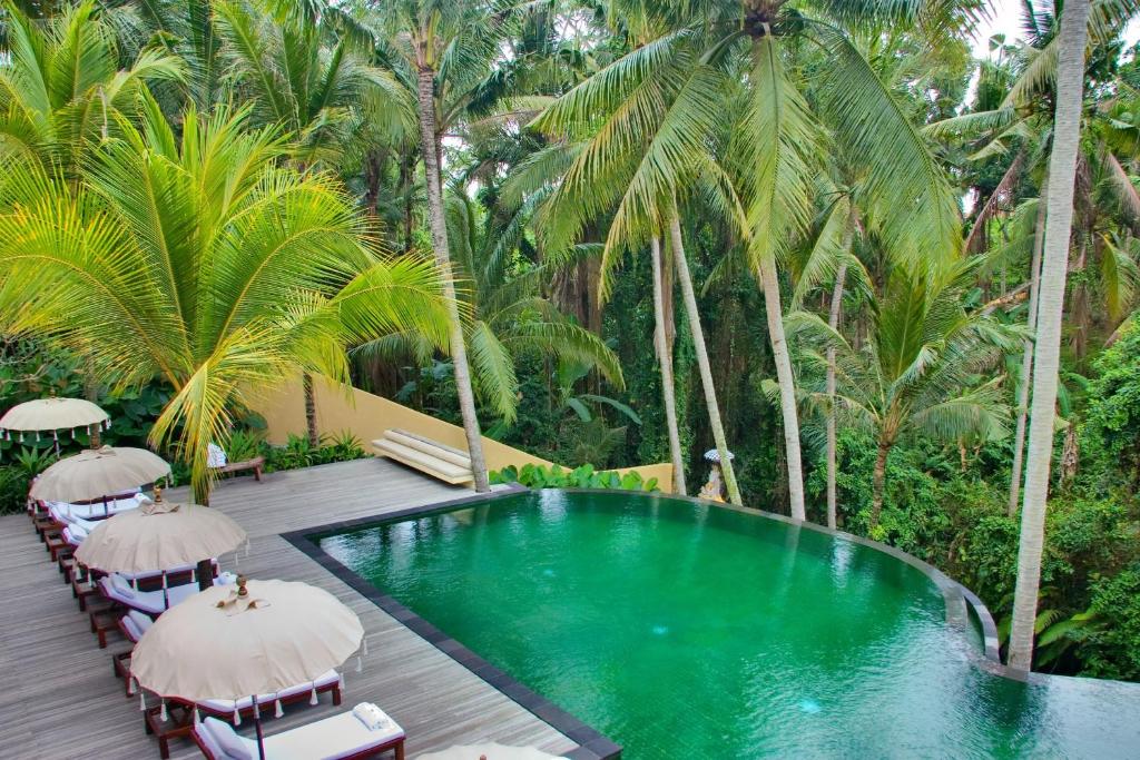Bazén v ubytování Komaneka at Rasa Sayang Ubud nebo v jeho okolí