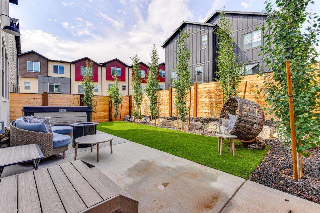 a backyard with a ping pong table and a lawn at Park City Home with Game Room Ski, Mtn Bike and More! in Park City