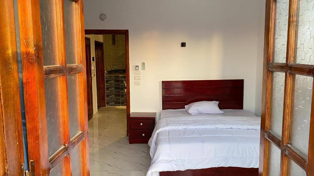Postel nebo postele na pokoji v ubytování villa Sun Wing - Guest House