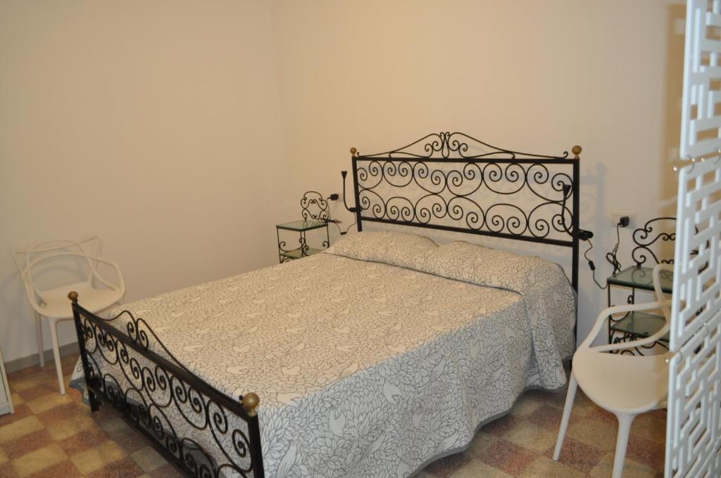 Postel nebo postele na pokoji v ubytování Ninetta e Luigino