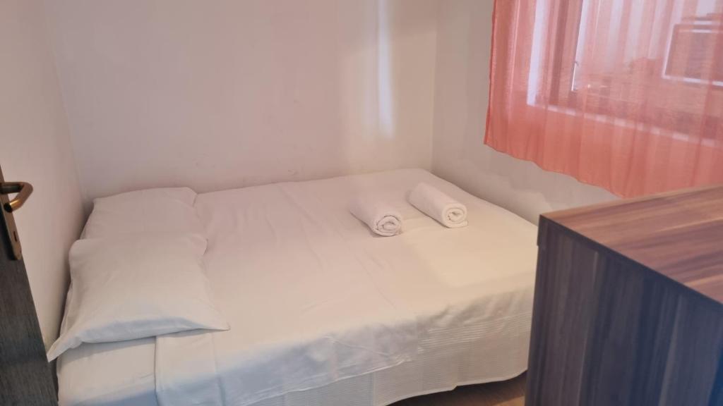 Postel nebo postele na pokoji v ubytování Apartment Mari