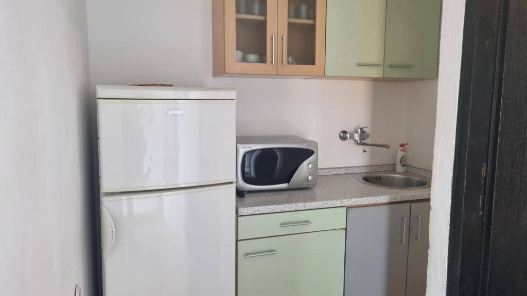 Kuchyň nebo kuchyňský kout v ubytování Apartment Mari