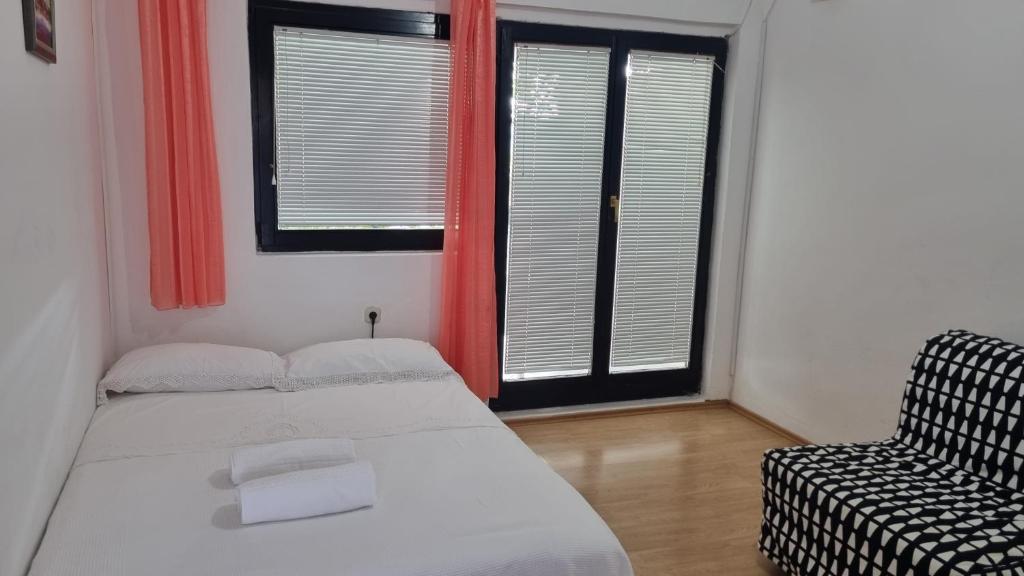 Postel nebo postele na pokoji v ubytování Apartment Mari