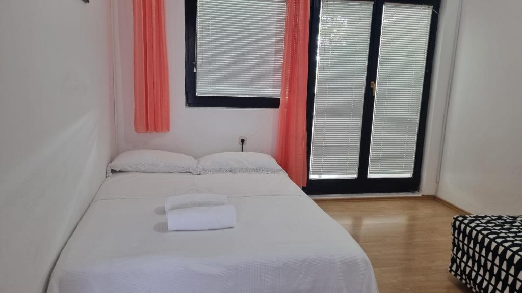 Postel nebo postele na pokoji v ubytování Apartment Mari