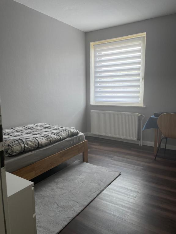 Postel nebo postele na pokoji v ubytování Monteur- oder Studentenzimmer