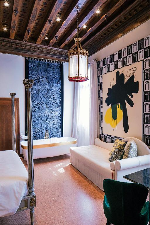 Postel nebo postele na pokoji v ubytování Hotel Heureka
