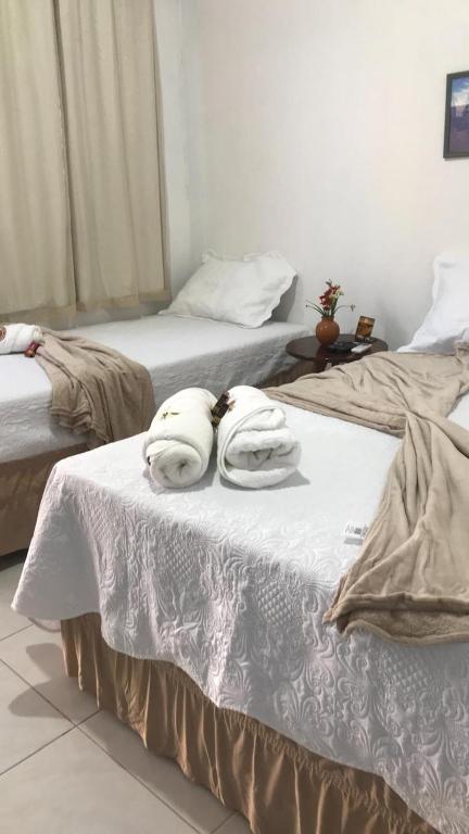 Cama ou camas em um quarto em Pousada Giro das dunas