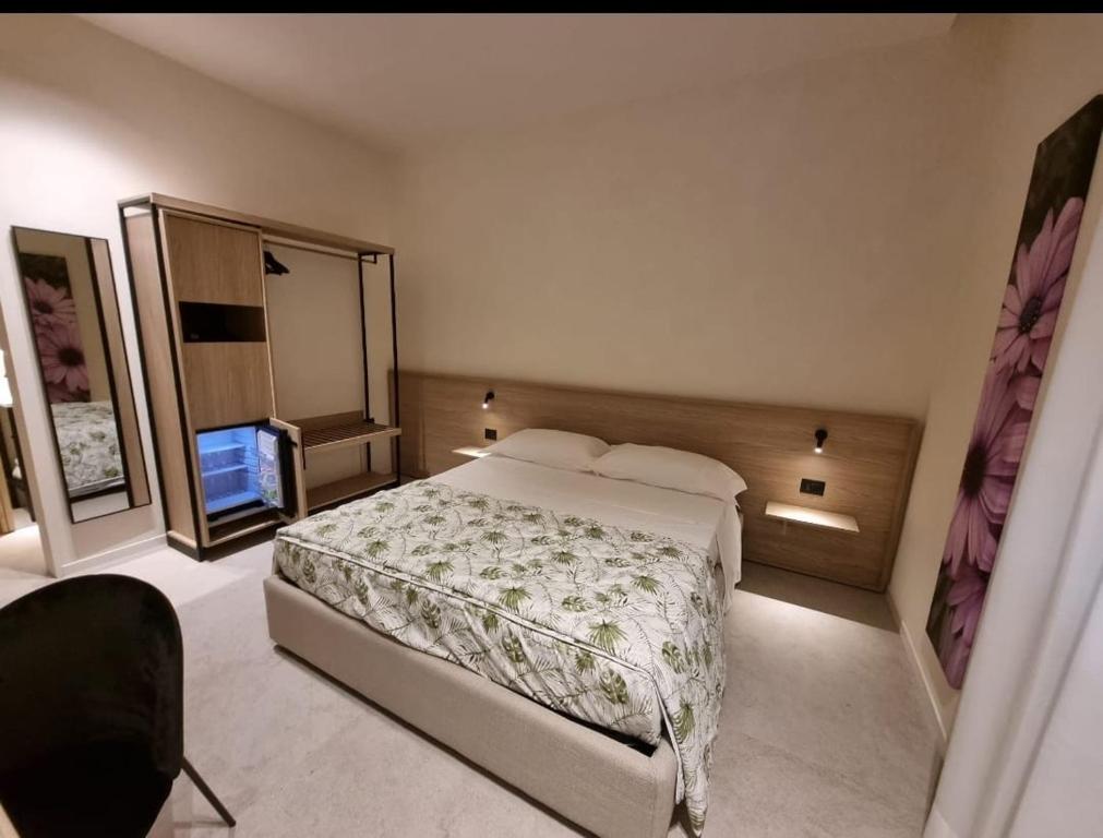 Letto o letti in una camera di GRAFEA Apartment&Rooms Catania