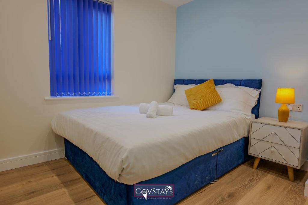 Postel nebo postele na pokoji v ubytování Beauchamp House - Apartment in Coventry City Centre by CovStays