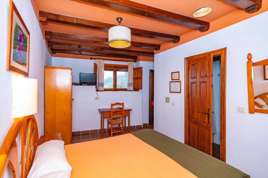 TV a/nebo společenská místnost v ubytování Hotel La Fragua I