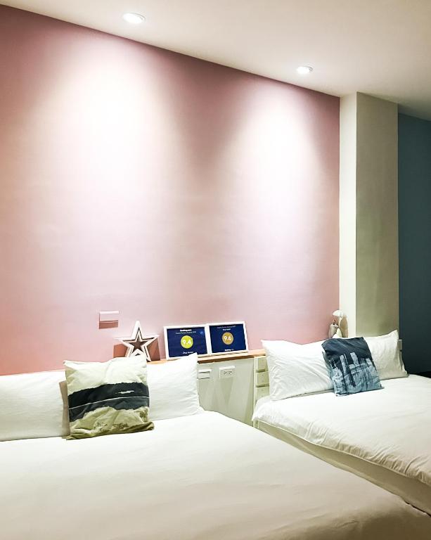 Postel nebo postele na pokoji v ubytování Zhuji Hostel