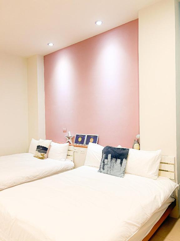 Postel nebo postele na pokoji v ubytování Zhuji Hostel
