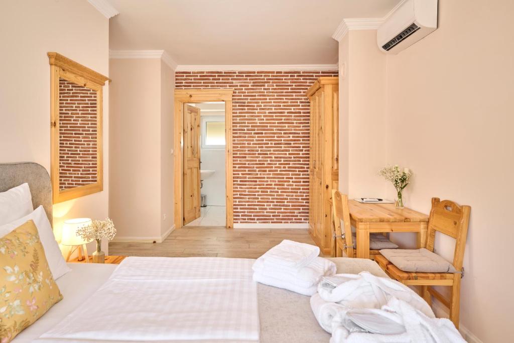 Postel nebo postele na pokoji v ubytování Hotel Kadoor