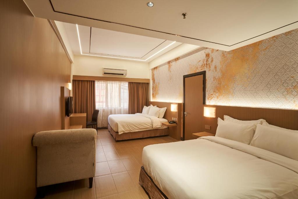 Postel nebo postele na pokoji v ubytování BTC Hotel 比特币酒店