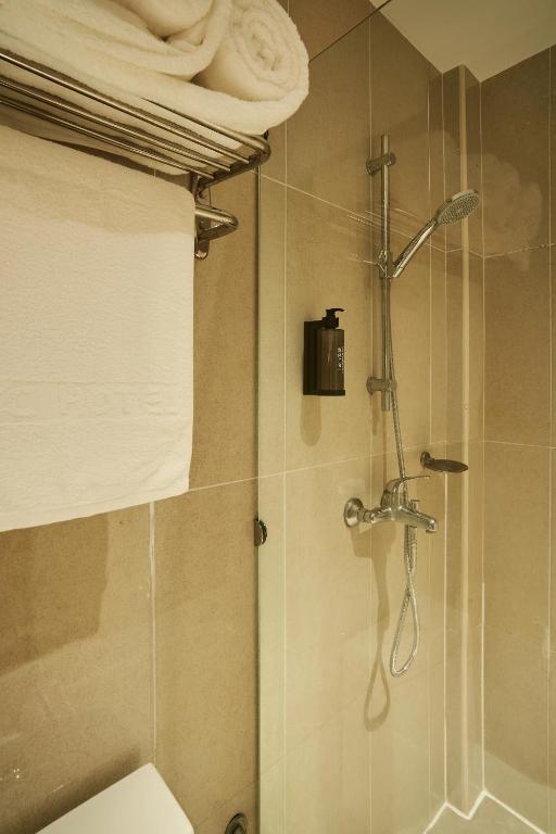 Koupelna v ubytování BTC Hotel 比特币酒店
